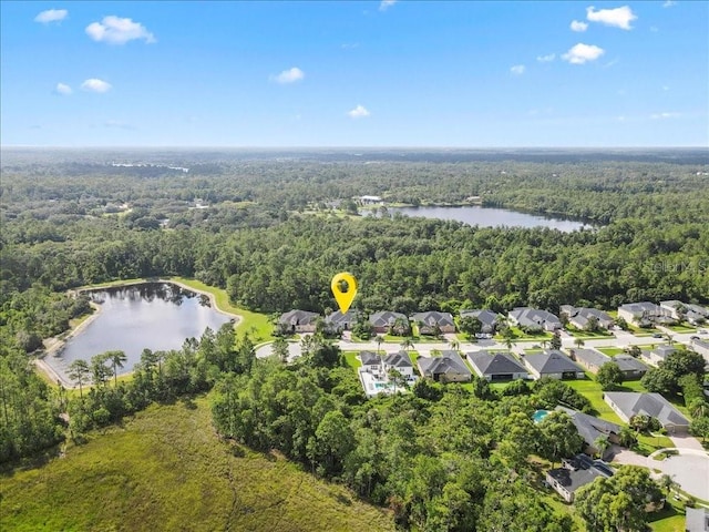 4080 Safflower Ter, Oviedo, FL 32766 - aerial view of residential area with a heavily wooded area and a large body of water