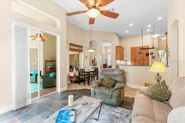 4080 Safflower Ter, Oviedo, FL 32766 - living room featuring ceiling fan, arched walkways, and recessed lighting