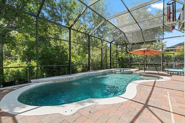 4080 Safflower Ter, Oviedo, FL 32766 - view of pool with a patio, a pool with connected hot tub, and glass enclosure