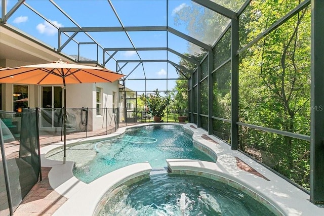 4080 Safflower Ter, Oviedo, FL 32766 - view of pool featuring a pool with connected hot tub, a patio area, and glass enclosure