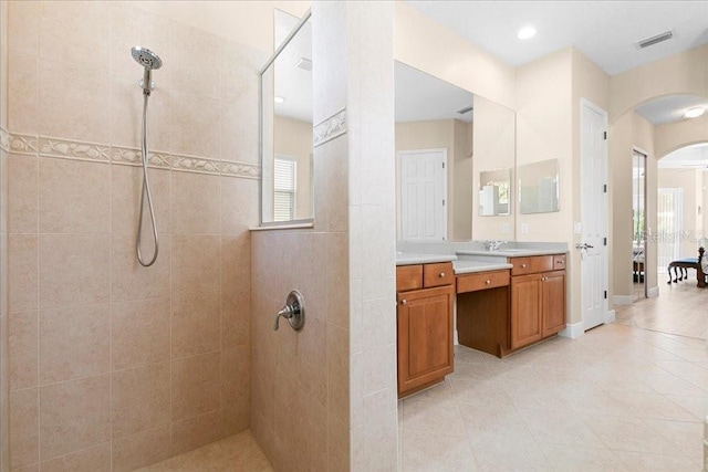 4080 Safflower Ter, Oviedo, FL 32766 - ensuite bathroom with a walk in shower, vanity, and tile patterned floors