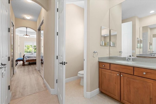 4080 Safflower Ter, Oviedo, FL 32766 - bathroom with connected bathroom, vanity, a ceiling fan, and tile patterned floors