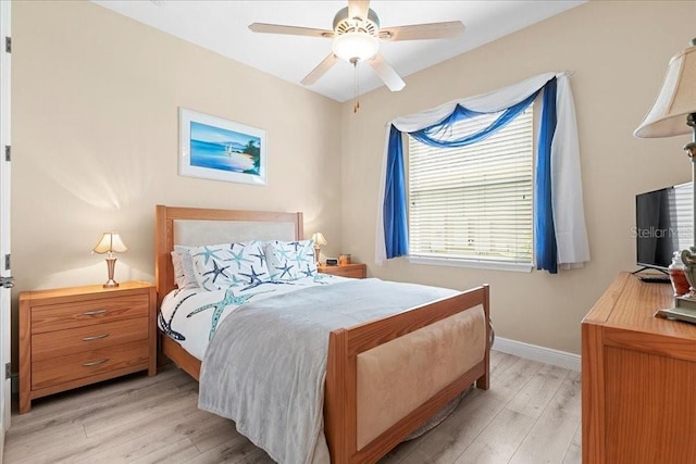 4080 Safflower Ter, Oviedo, FL 32766 - bedroom with light wood-style flooring and a ceiling fan