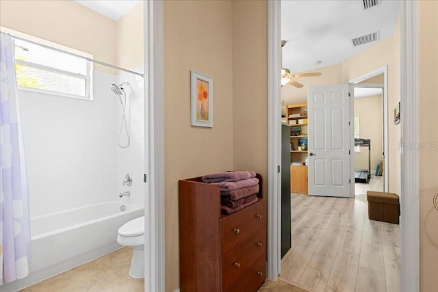 4080 Safflower Ter, Oviedo, FL 32766 - full bath featuring shower / tub combo, wood finished floors, and a ceiling fan