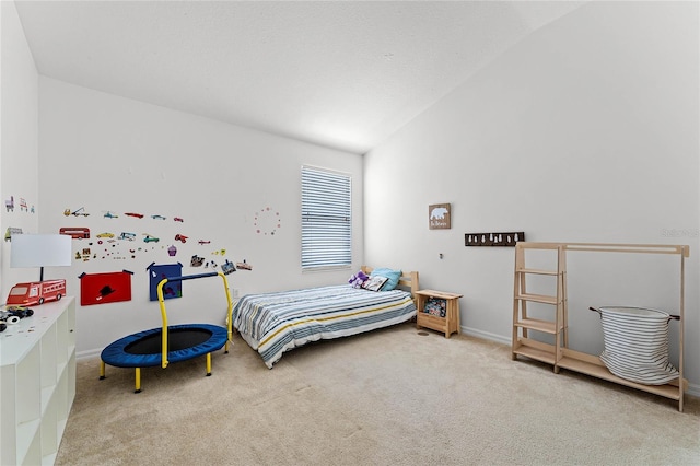 14466 Bridgewater Crossings Blvd, Windermere, FL 34786 - carpeted bedroom with lofted ceiling and baseboards