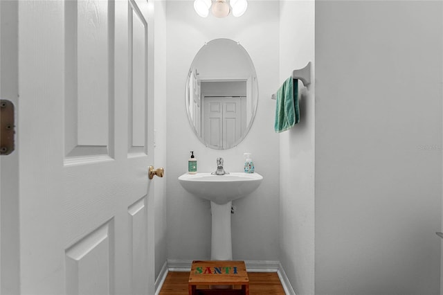 14466 Bridgewater Crossings Blvd, Windermere, FL 34786 - bathroom featuring wood finished floors and baseboards