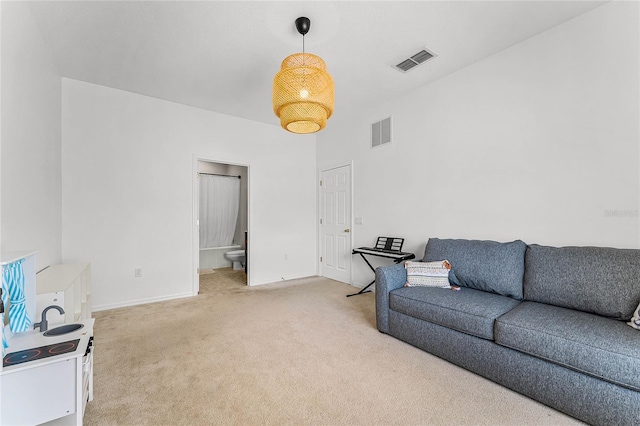 14466 Bridgewater Crossings Blvd, Windermere, FL 34786 - living room featuring light carpet and baseboards