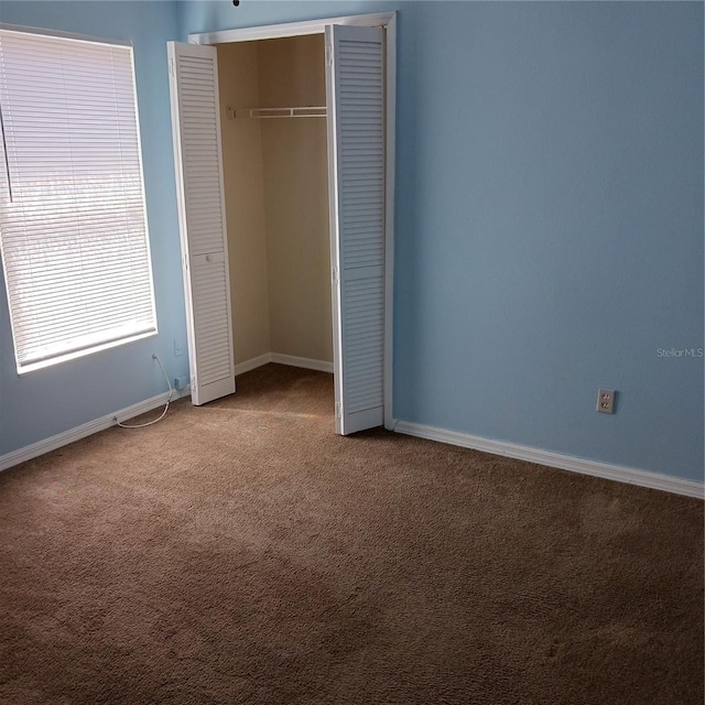 289 White Marsh Cir, Orlando, FL 32824 - unfurnished bedroom with carpet and a closet