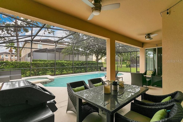 4060 Oak Tree Dr, Davenport, FL 33837 - view of swimming pool with ceiling fan, a patio area, a pool with connected hot tub, and a lanai