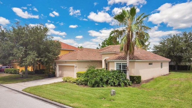4060 Oak Tree Dr, Davenport, FL 33837 - mediterranean / spanish home featuring a garage, stucco siding, a front lawn, concrete driveway, and a tile roof
