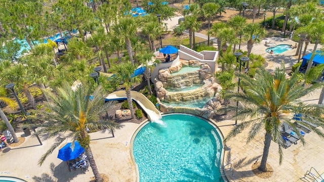 4060 Oak Tree Dr, Davenport, FL 33837 - community pool with a water slide