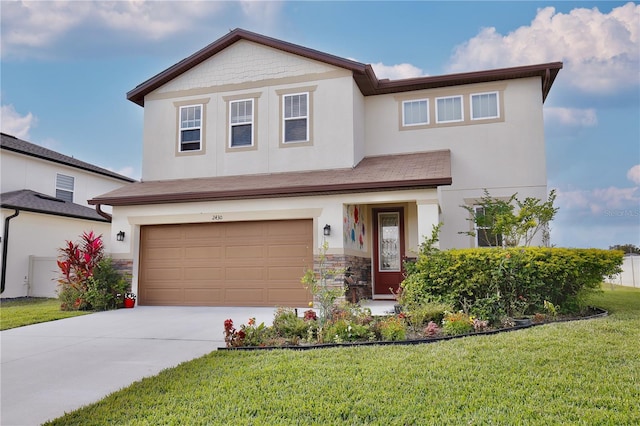 2430 Bittle Way, Saint Cloud, FL 34769 - view of front facade with an attached garage, a front yard, driveway, and stucco siding
