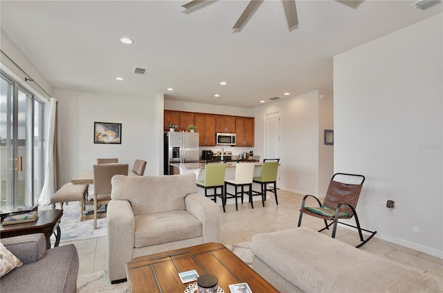 2430 Bittle Way, Saint Cloud, FL 34769 - living room with light tile patterned flooring, ceiling fan, and recessed lighting