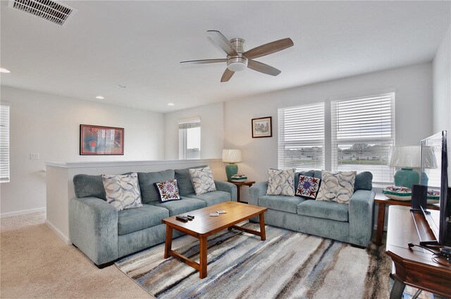 2430 Bittle Way, Saint Cloud, FL 34769 - carpeted living area featuring a ceiling fan and recessed lighting
