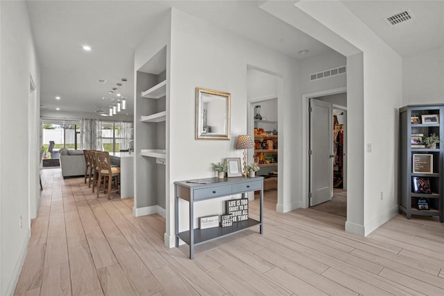 3336 Jackson Bluff Way, Clermont, FL 34711 - hall featuring light wood-style flooring and recessed lighting