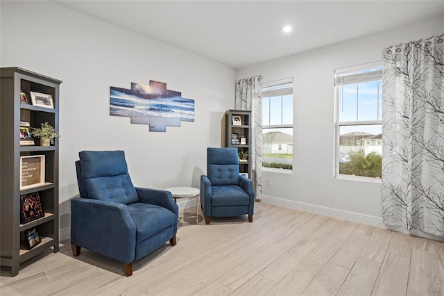 3336 Jackson Bluff Way, Clermont, FL 34711 - sitting room featuring light wood finished floors and recessed lighting