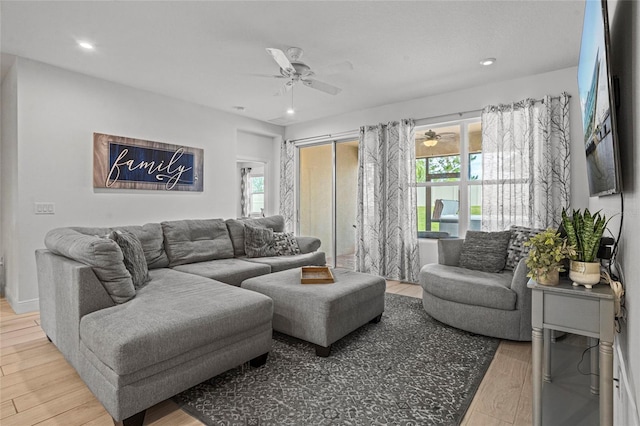 3336 Jackson Bluff Way, Clermont, FL 34711 - living room with ceiling fan, wood finished floors, healthy amount of natural light, and recessed lighting