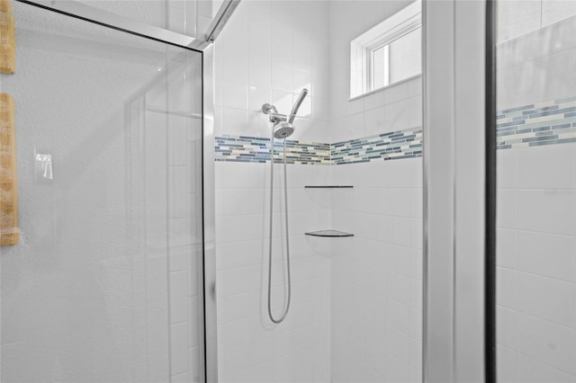 3336 Jackson Bluff Way, Clermont, FL 34711 - bathroom featuring a shower stall