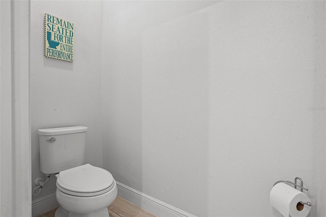 3336 Jackson Bluff Way, Clermont, FL 34711 - bathroom featuring baseboards and wood finished floors