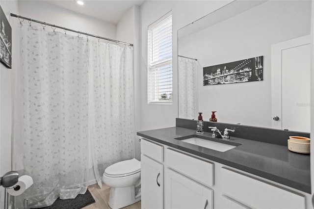 3336 Jackson Bluff Way, Clermont, FL 34711 - bathroom featuring vanity, wood finished floors, and a shower with curtain