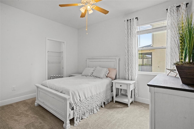 3336 Jackson Bluff Way, Clermont, FL 34711 - carpeted bedroom with baseboards and a ceiling fan