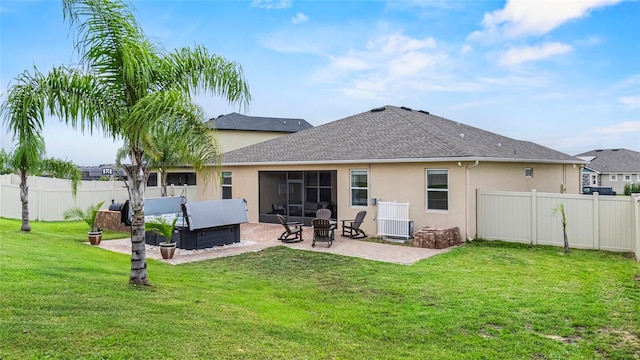 3336 Jackson Bluff Way, Clermont, FL 34711 - rear view of house featuring stucco siding, a patio area, and a fenced backyard