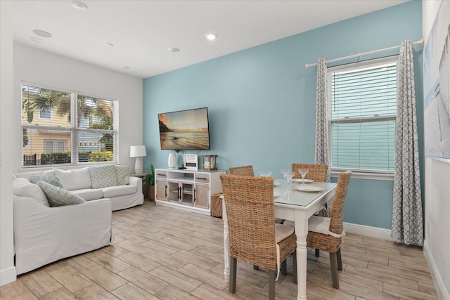 8017 Sandy Toes Way, Kissimmee, FL 34747 - dining area with light wood-type flooring and recessed lighting
