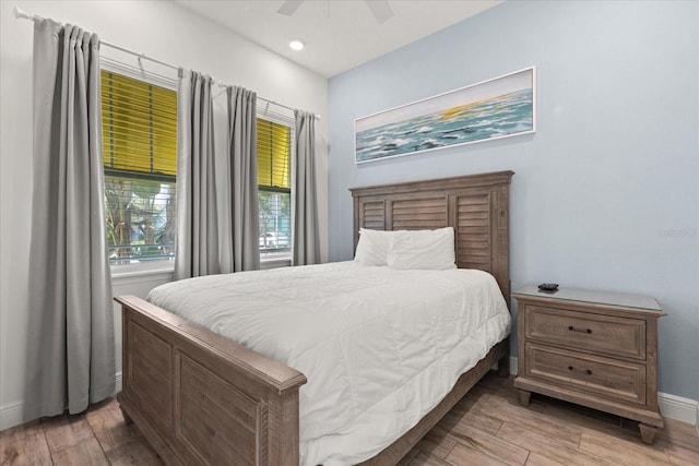 8017 Sandy Toes Way, Kissimmee, FL 34747 - bedroom with wood finished floors, ceiling fan, and recessed lighting