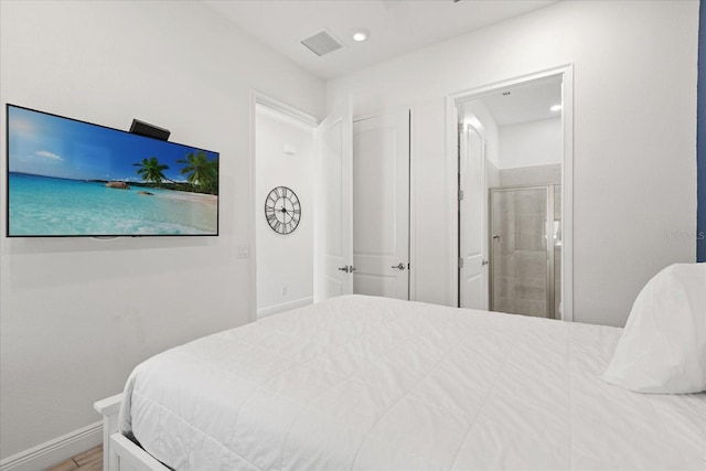 8017 Sandy Toes Way, Kissimmee, FL 34747 - bedroom with ensuite bath and recessed lighting