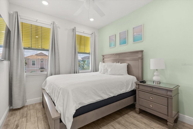 8017 Sandy Toes Way, Kissimmee, FL 34747 - bedroom featuring light wood-style flooring, recessed lighting, and a ceiling fan