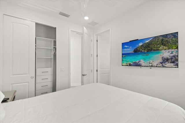 8017 Sandy Toes Way, Kissimmee, FL 34747 - bedroom featuring a ceiling fan and a closet