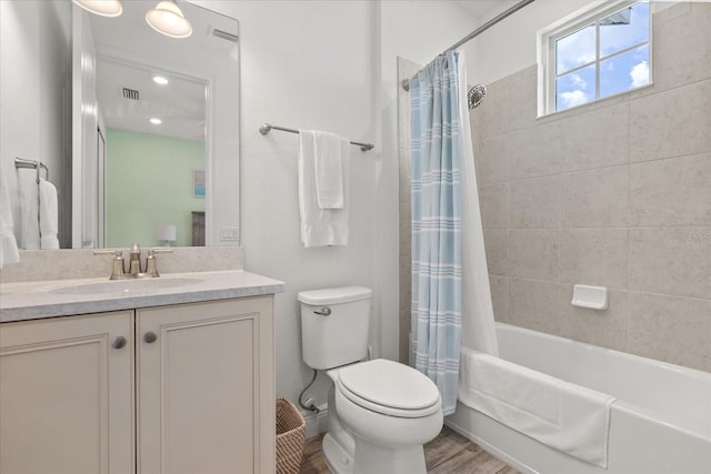 8017 Sandy Toes Way, Kissimmee, FL 34747 - full bath featuring vanity, shower / bath combo, and wood finished floors