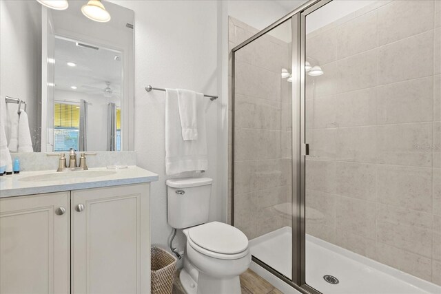8017 Sandy Toes Way, Kissimmee, FL 34747 - full bathroom featuring vanity, a shower stall, and ceiling fan