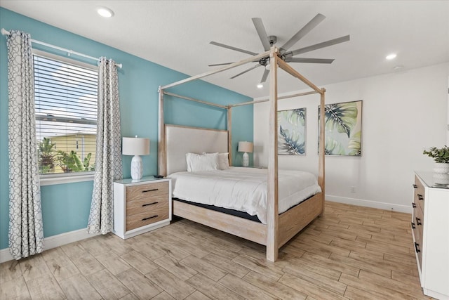 8017 Sandy Toes Way, Kissimmee, FL 34747 - bedroom featuring light wood-style floors, recessed lighting, and a ceiling fan