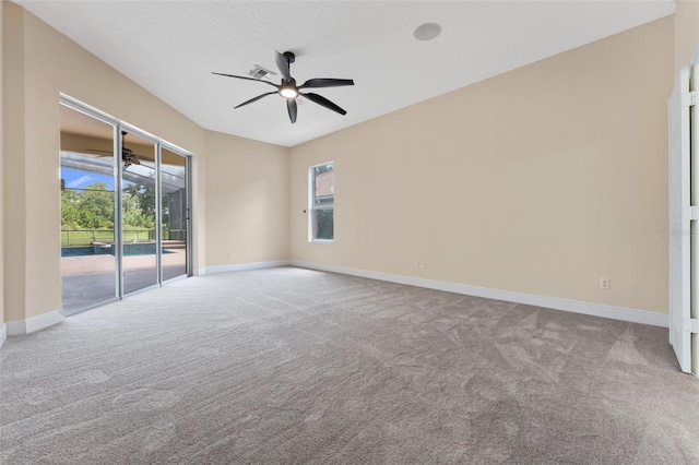 11031 Ledgement Ln, Windermere, FL 34786 - spare room featuring carpet, a ceiling fan, and plenty of natural light