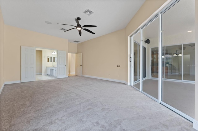 11031 Ledgement Ln, Windermere, FL 34786 - unfurnished bedroom featuring carpet floors, a ceiling fan, and connected bathroom