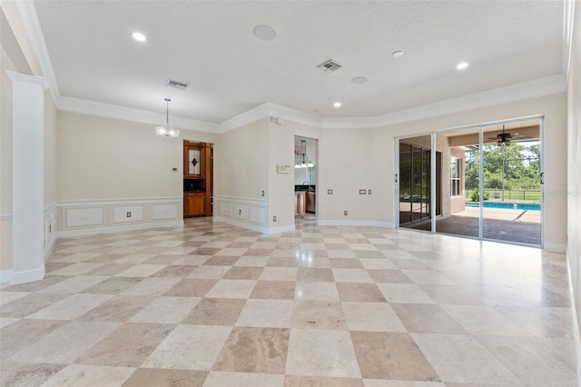 11031 Ledgement Ln, Windermere, FL 34786 - spare room with ornamental molding, a decorative wall, recessed lighting, and a textured ceiling