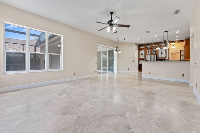 11031 Ledgement Ln, Windermere, FL 34786 - unfurnished living room with a ceiling fan, recessed lighting, and a chandelier