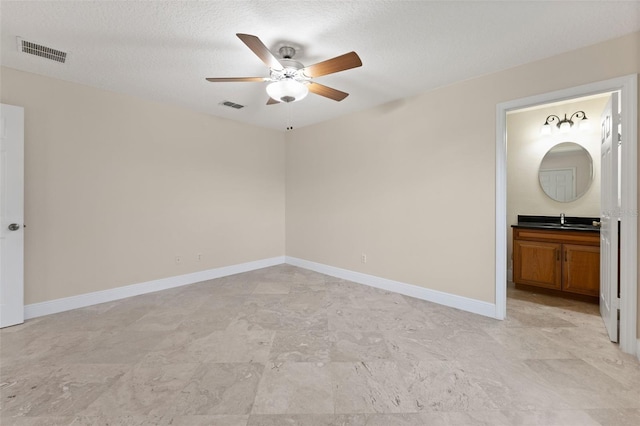 11031 Ledgement Ln, Windermere, FL 34786 - unfurnished bedroom with connected bathroom and a ceiling fan