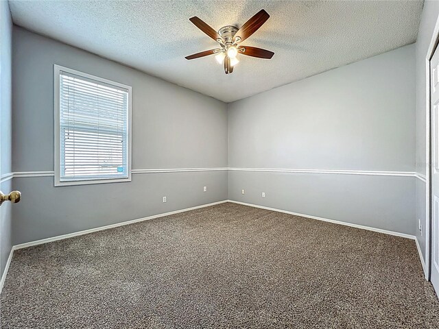 5754 Magnolia Bloom Ter, Oviedo, FL 32765 - empty room featuring carpet floors, ceiling fan, and a textured ceiling