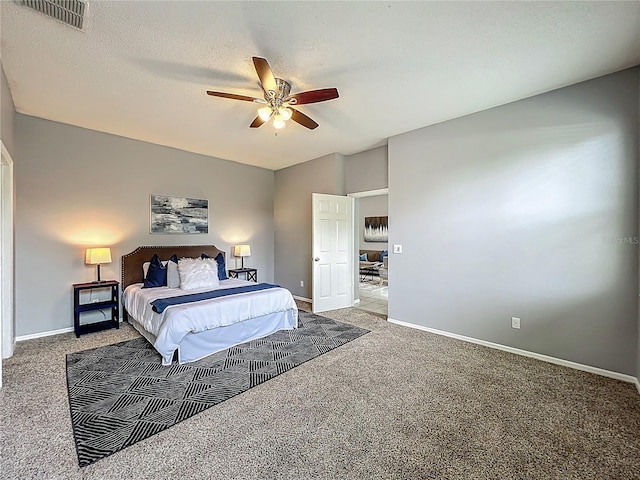 5754 Magnolia Bloom Ter, Oviedo, FL 32765 - bedroom with carpet, a ceiling fan, and a textured ceiling