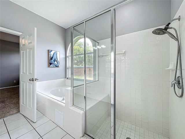 5754 Magnolia Bloom Ter, Oviedo, FL 32765 - full bath with a stall shower, tile patterned flooring, and a bath