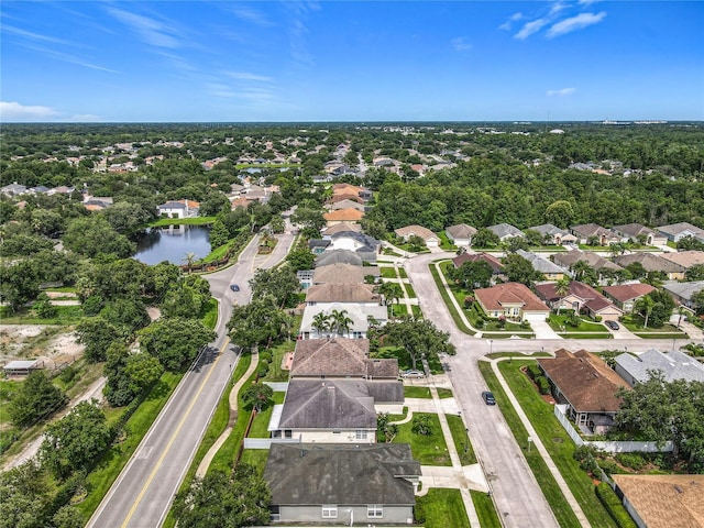 5754 Magnolia Bloom Ter, Oviedo, FL 32765 - aerial overview of property's location with nearby suburban area and a large body of water