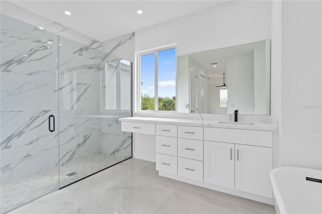 13438 Mcintosh Ave, Port Charlotte, FL 33981 - full bath featuring marble tiled flooring, a marble finish shower, healthy amount of natural light, vanity, and recessed lighting