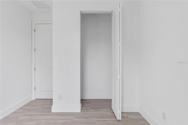 13438 Mcintosh Ave, Port Charlotte, FL 33981 - unfurnished bedroom with light wood-style floors and a closet