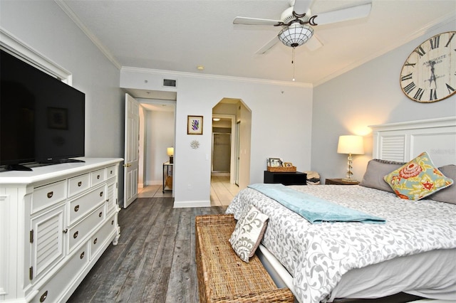 4624 Harbour Village Blvd Unit 4206, Ponce Inlet, FL 32127 - bedroom featuring arched walkways, crown molding, dark wood-type flooring, and ceiling fan