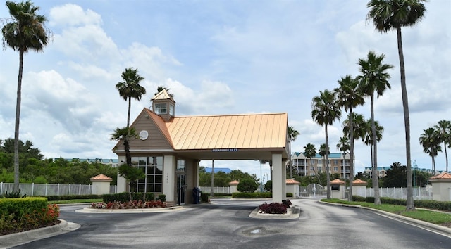 4624 Harbour Village Blvd Unit 4206, Ponce Inlet, FL 32127 - view of asphalt street featuring curbs, a gate, and a gated entry