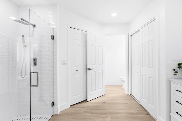 7450 Franzino Ave, North Port, FL 34291 - hallway featuring light wood-type flooring and recessed lighting