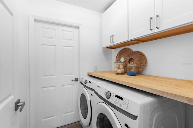 7450 Franzino Ave, North Port, FL 34291 - washroom featuring cabinet space and washer and clothes dryer