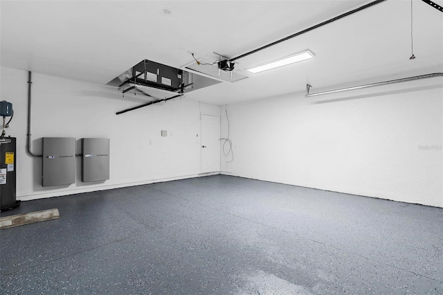 7450 Franzino Ave, North Port, FL 34291 - garage with electric water heater and a garage door opener